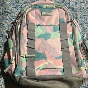 Beautiful Used Backpack in a great condition Color Pink and Gray.